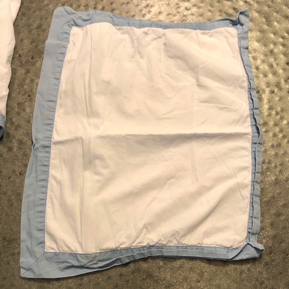 The Company Store White with Light Blue Boudior pillow cases set of six.